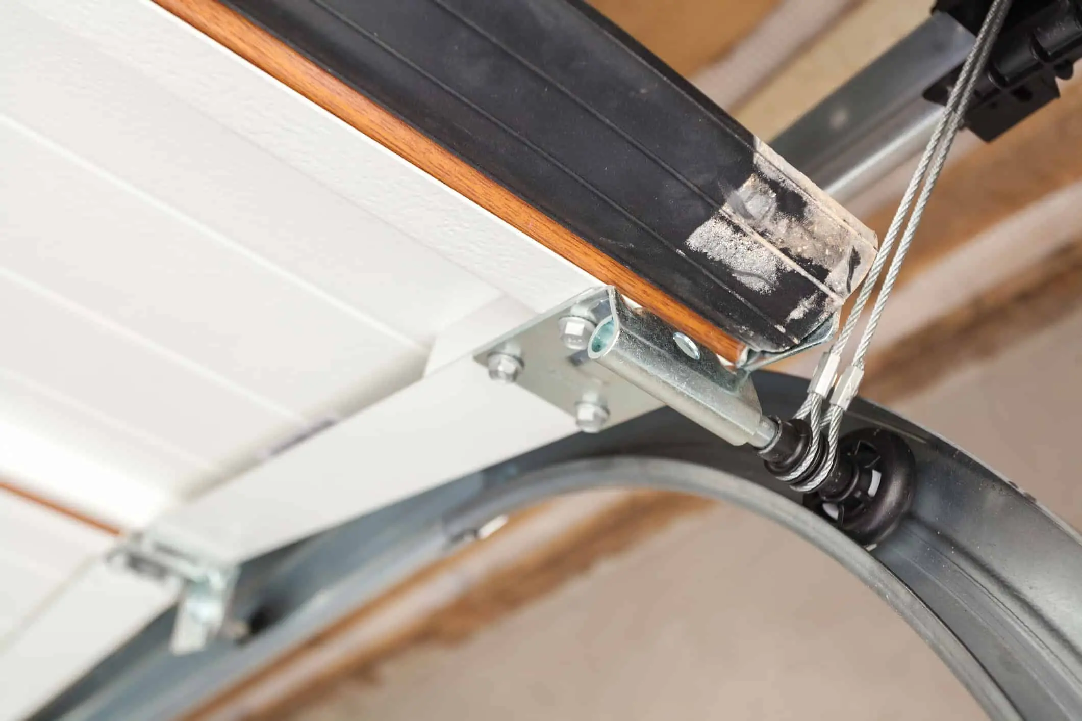 Rollers and Cables. Close up of garage door lifting system.