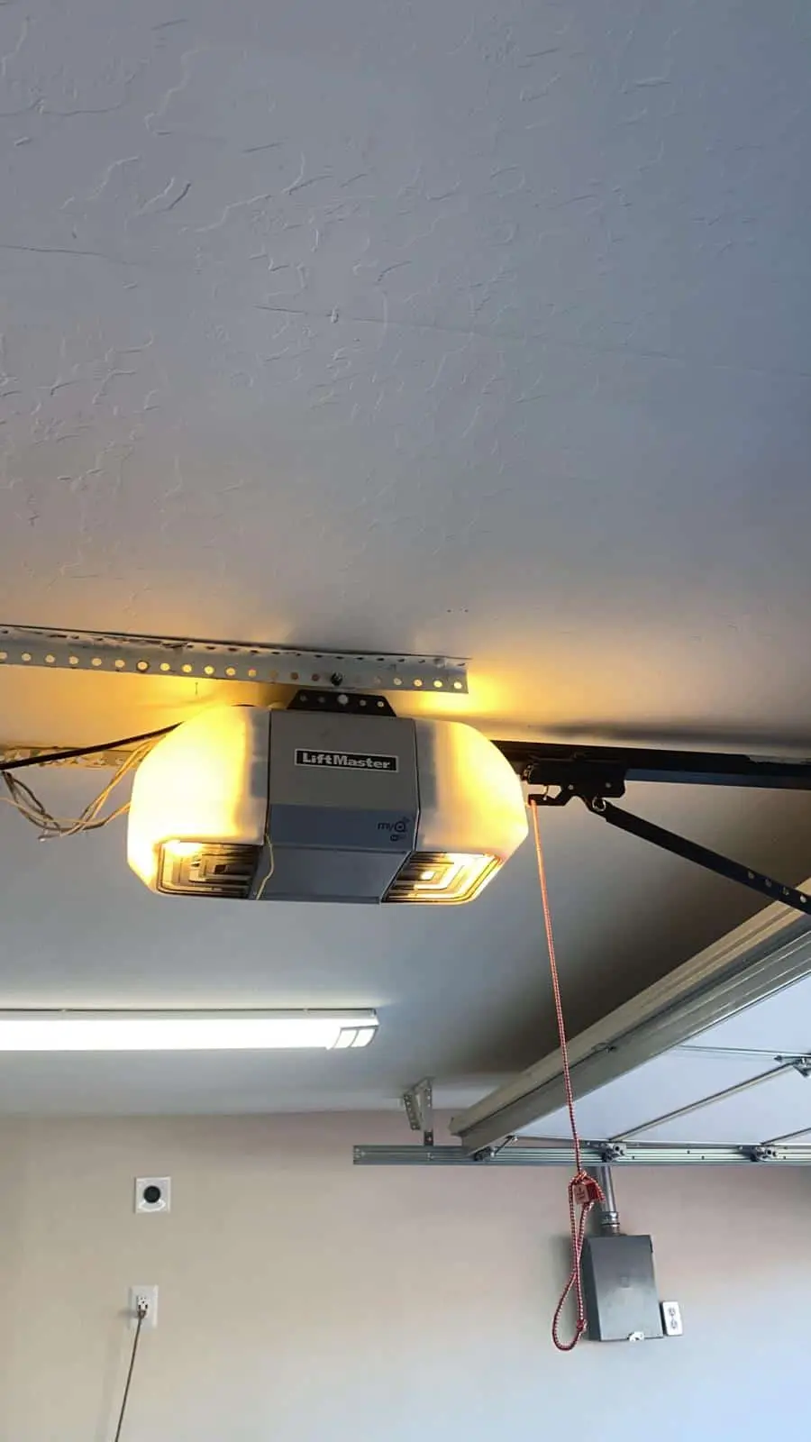 garage door motor inside an open garage.
