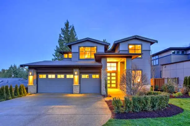 Grey luxury modern two story tall house exterior.