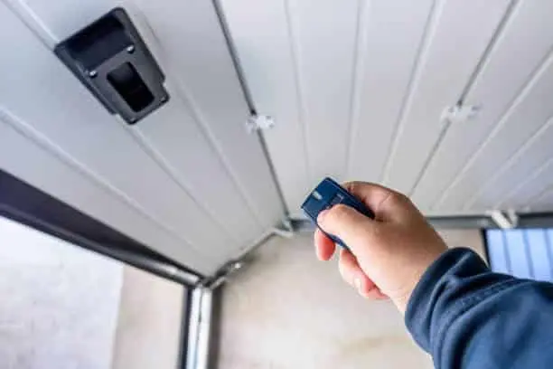 Hand use remote controller for closing and opening garage door