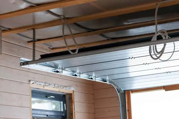 maintaining of a roller shutter gatage door, indoor shot