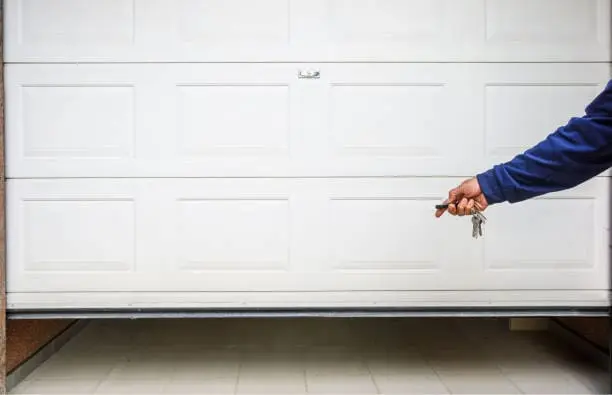 Hand use remote controller for closing and opening garage door