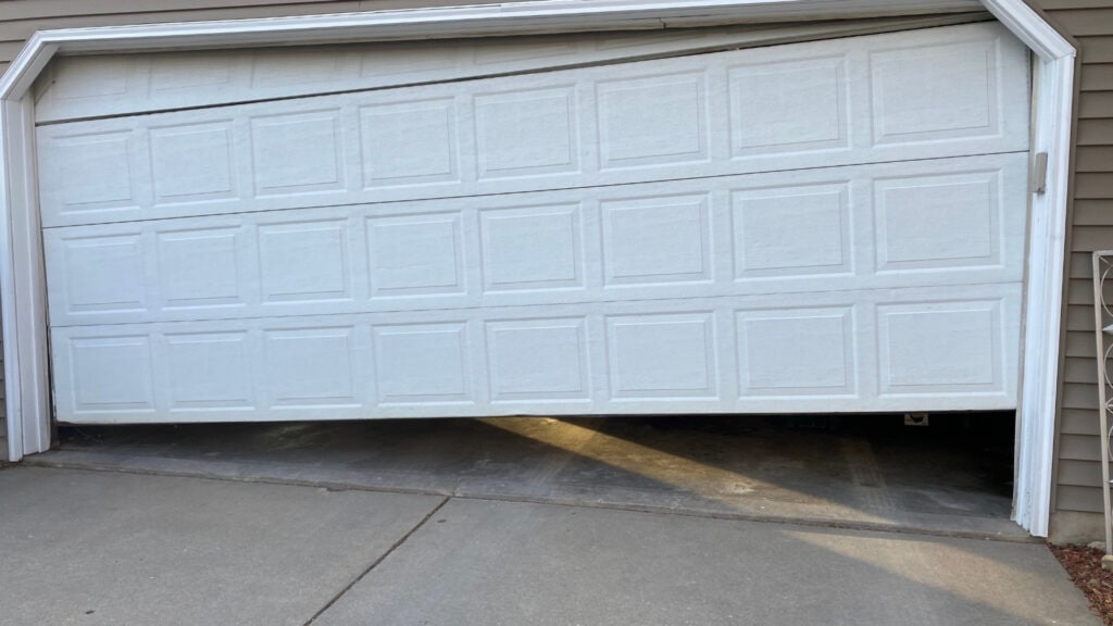 A garage door off track not closing all the way