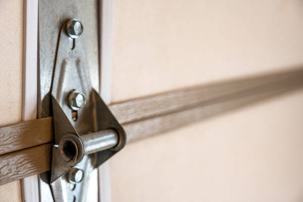 Metal hardware on white door