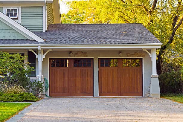 Two wooden car garage residence - Cass City Garage Door Repair