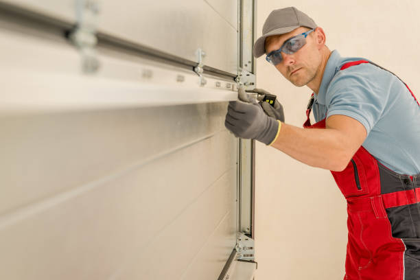 Repairing A Residential Garage Door by Professional Technician