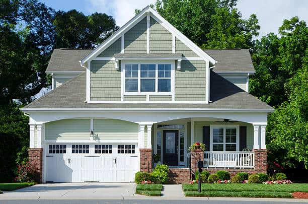 A new, Victorian-style, bungalow cottage home. Madison Heights Garage Door Repair.