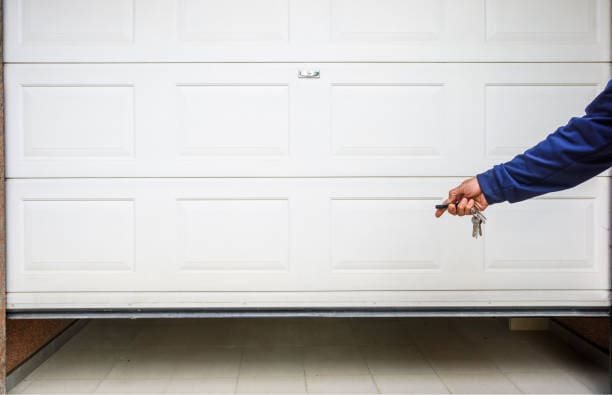 Hand use remote controller for closing and opening garage door -Garage Door Repair Eaton Rapids