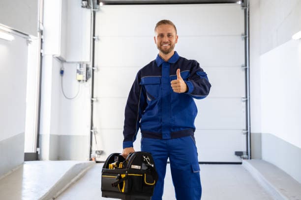 Garage Door Installation And Repair At Home. Contractor Man In House