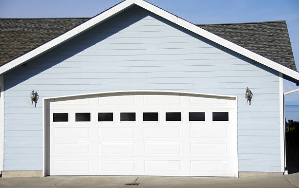 Arched garage door opening on a new residential home.